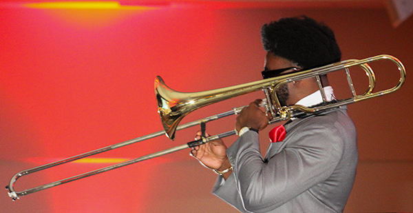 A performer playing the trumpet the Soul Soiree