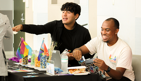 Students checking in participants at the Coming Out Day Tabling Fair at the University of Miami