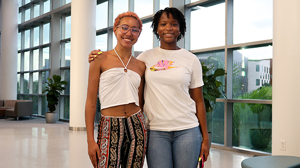 Two students at the United Black Students Culture Bash at the University of Miami